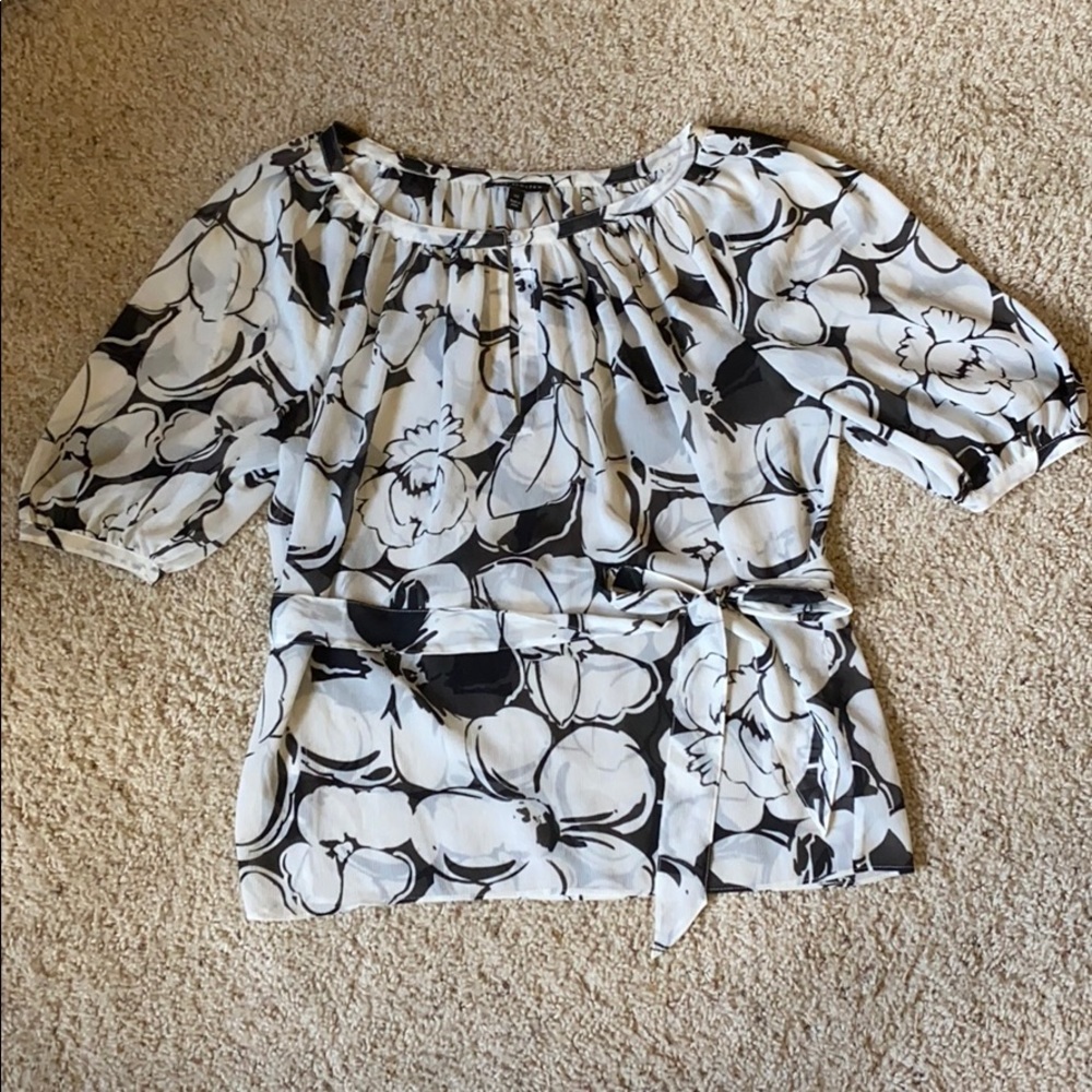 White with black floral blouse